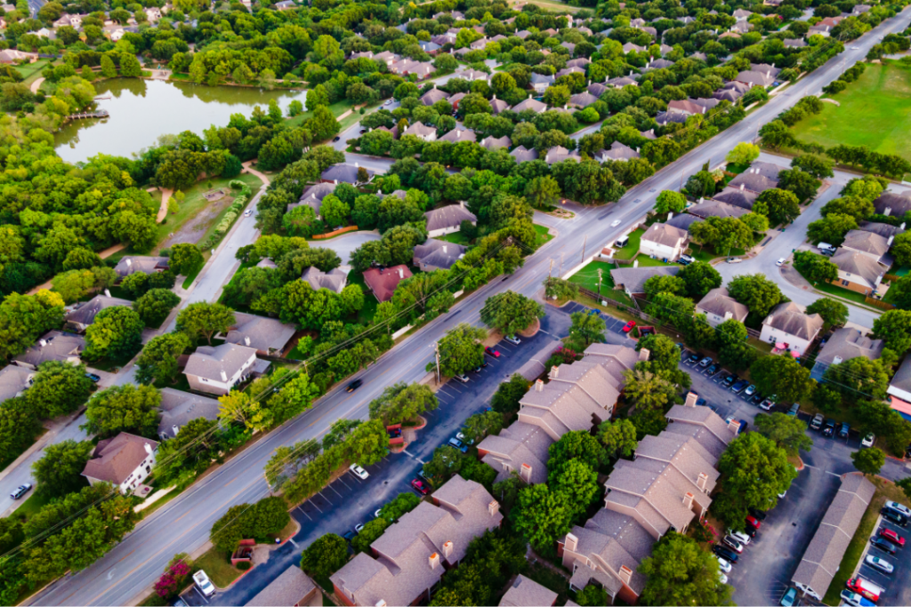 Aerial view of Toronto suburb neighbourhood with homes and nature area